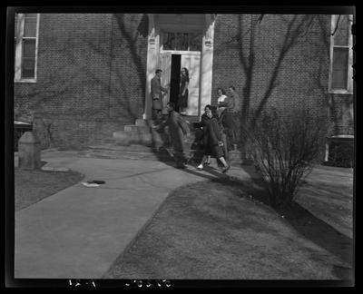 Georgetown College; Leap Year Photo; exterior; group gathered                             near the entranceway to a building