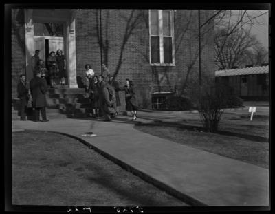 Georgetown College; Leap Year Photo; exterior; group gathered                             near the entranceway to a building