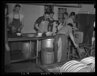 Georgetown College; interior; group washing dishes