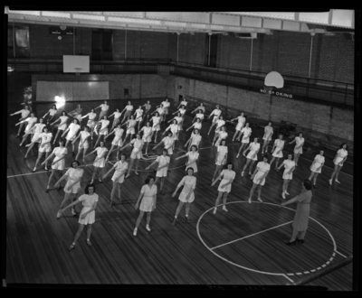 Garth High School, Georgetown; girls gym; group on                             floor