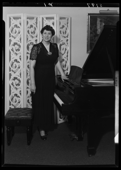 Mrs. Boughton; woman with piano (Shackleton’s Music Store                             Incorporated)