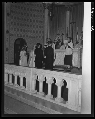 Mr. & Mrs. Tierney; wedding; interior of church; wedding                             ceremony