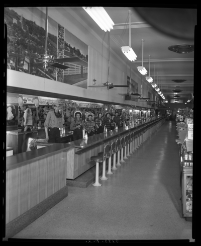 S.S. Kresge & Company (156, 250 West Main), by Mrs.                             Thorpe; people in costume behind counter