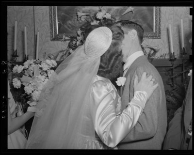 Mr. & Mrs. Tom Skillman; wedding; bride and groom                             kissing
