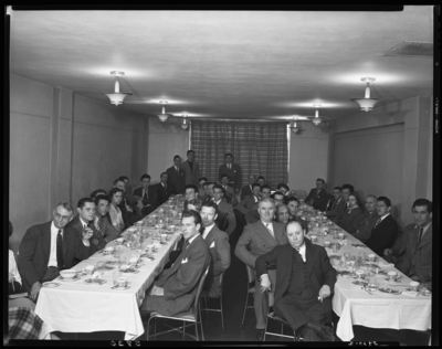 Students for Democratic Action; University of Kentucky; Student                             Union Building, Room 205; interior; banquet; group portrait