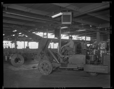Kawneer Company, 817 East 3rd (Third); interior; man operating a                             portable Crane manufactured by Silen Hoist & Crane Company                             (Brooklyn, New York)