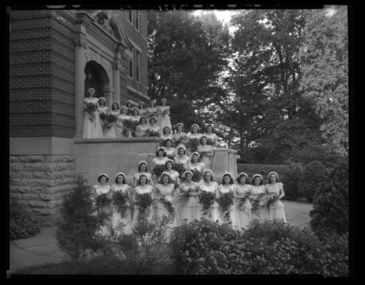 Cardome Academy; exterior; women graduates standing on steps;                             group portrait