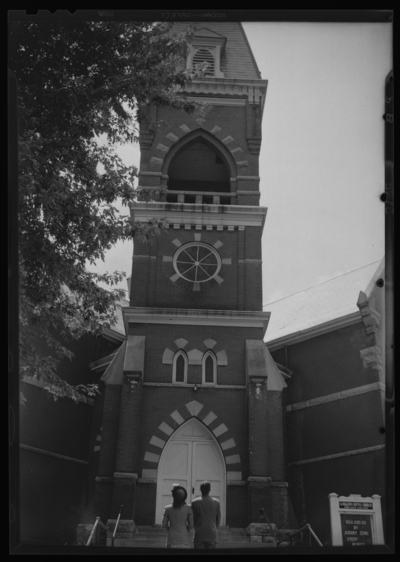 Georgetown College; Georgetown Baptist Church; exterior; man and                             women walking up church steps