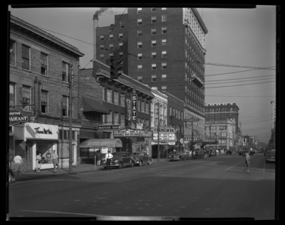 East Main, between Esplanade and Walnut (now Martin Luther King),                             south side; 226 through 200 East Main; visible are Thom McAn Shoe Store                             (226 E. Main), Mayfair Bar (224 E. Main), State Theatre (220 E. Main,                             marquee lists 