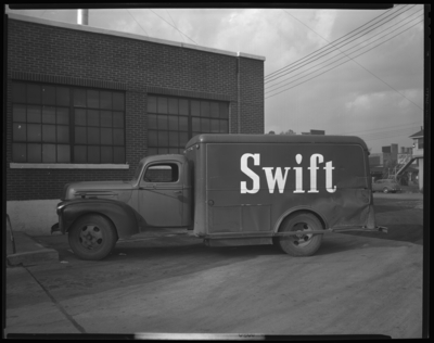 Swift & Company (115 Shreve Avenue); exterior; damaged                             truck parked next to building