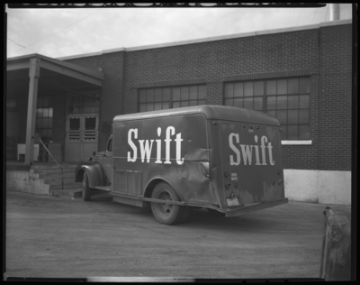 Swift & Company (115 Shreve Avenue); exterior; damaged                             truck parked next to building