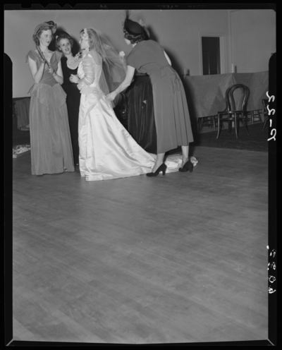 Carojean (Carolyn) Elsey; Wedding; interior; bride with                             bridesmaids