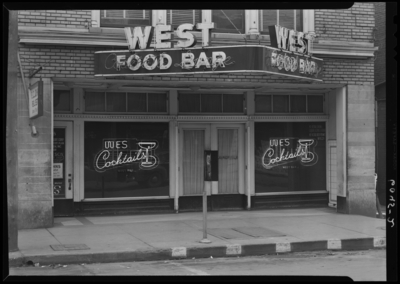 West Bar (Wes Bar), 140 West Short; exterior; window display and                             signs; sign read 