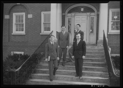 Belle of the Blue; Georgetown College; exterior; group standing                             on steps of building
