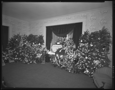 Ida Mae Ayers; corpse; open casket surrounded by                             flowers