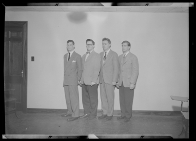 Belle of the Blue; Georgetown College; interior; four men; group                             portrait