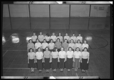 Belle of the Blue; Georgetown College; gymnasium (gym); interior;                             group of women on court; group portrait