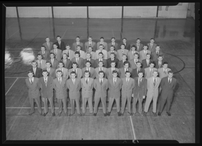 Belle of the Blue; Georgetown College; gymnasium (gym); interior;                             group of men standing on court; group portrait