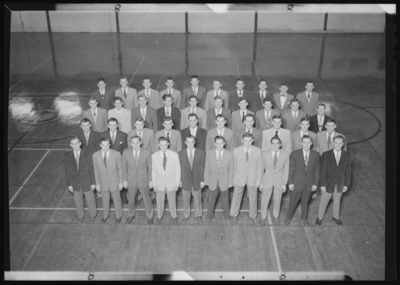 Belle of the Blue; Georgetown College; gymnasium (gym); interior;                             group of men standing on court; group portrait