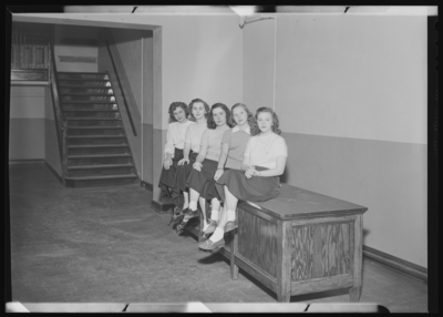 Belle of the Blue; Georgetown College; Belle of the Blue;                             Georgetown College; interior; group of women sitting on                             desktop
