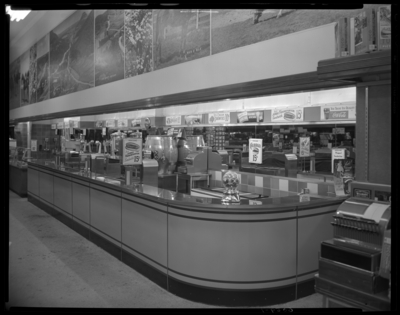S.S. Kresge & Company (250 West Main); interior;                             Richardson Beer display; photographic display banner above sales and                             cafe counters