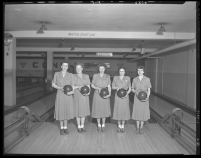B.F (B & F) Electric Company Bowling Team; Blue Grass                             Lanes; interior; group of women, team portrait