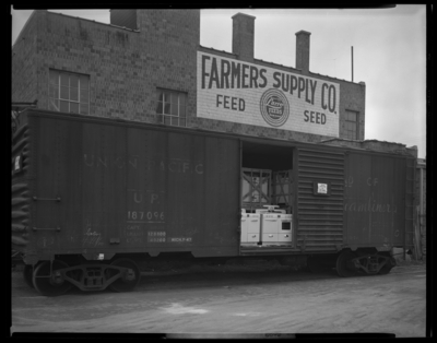 Farmers Supply Company, 325 East Vine; railroad (train) boxcar of                             stoves