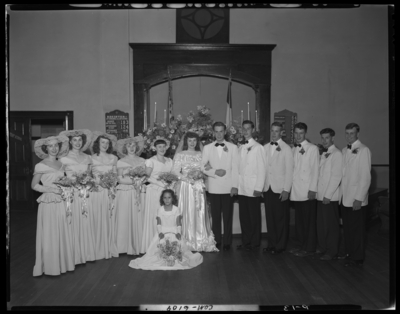 Tuttle, Mr. & Mrs. Fred; wedding; church; interior;                             wedding party; group portrait