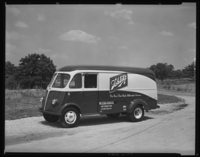 Webb Brothers (beer distributors), 260 East Vine; truck with side                             advertisement for Schlitz Beer