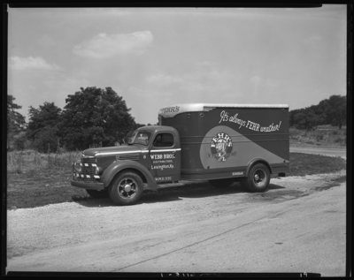 Webb Brothers (beer distributors), 260 East Vine; truck with side                             advertisement for Fehr's Beer