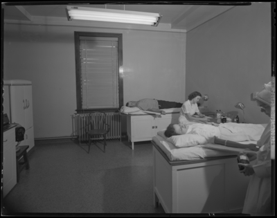 St. Joseph's Hospital, 544 West Second (2nd) Street;                             interior of Laboratory; patients getting blood drawn by                             nurses
