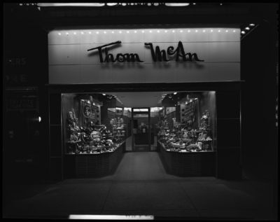 Thom McAn Shoe Company, store number 306 (#306, no. 306); 145                             West Main; exterior