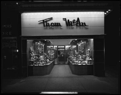 Thom McAn Shoe Company, store number 306 (#306, no. 306); 145                             West Main; exterior