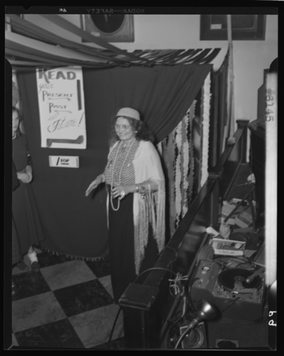 Belle of the Blue; Georgetown College; interior; woman dressed in                             costume