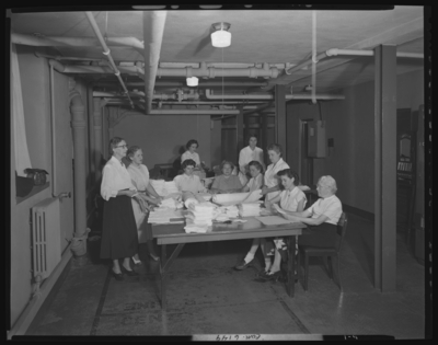 Good Samaritan Hospital, 310-330 South Limestone; Nurses Home;                             interior; basement; group of nurses rolling bandages
