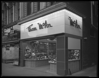 Thom McAn Shoe Company, 145 West Main; exterior; photograph                             requested by Melville Shoe Corporation (New York)