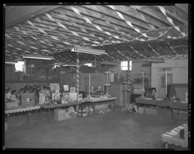 Radio Equipment Company, 377 East Main; interior; presentation;                             large group seated; display tables