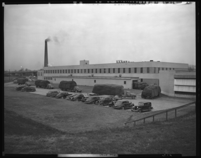 P. Lorillard Company (Price Road and Leestown Pike); factory;                             exterior, parking lot; tobacco trucks waiting in line to drive into                             factory loading dock