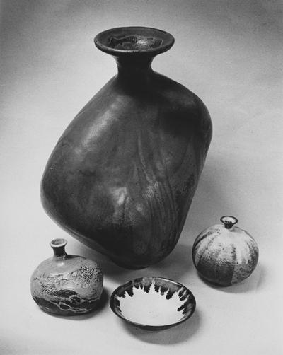Three glazed ceramic pots and a dish by John Tuska