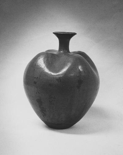 A ceramic vase shaped like an apple by John Tuska