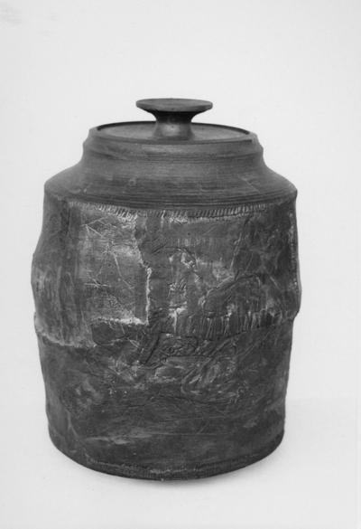 A ceramic covered jar by John Tuska