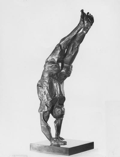 A bronze sculpture with a black Belgian marble base entitled 