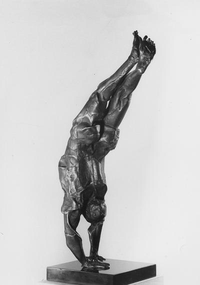 A bronze sculpture with a black Belgian marble base entitled 