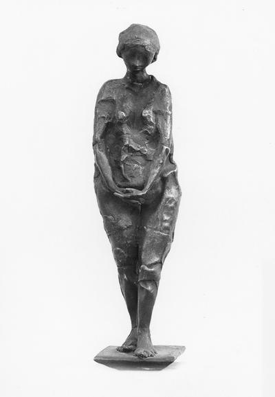 A bronze figure sculpture with a Georgian marble base entitled 