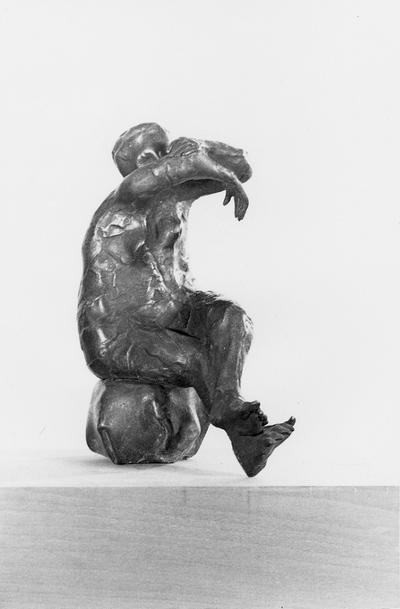 A bronze figure sculpture with a Georgian marble base entitled 