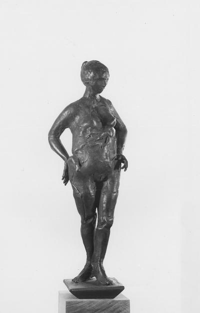 A bronze sculpture of a female nude with a Georgian marble base entitled 