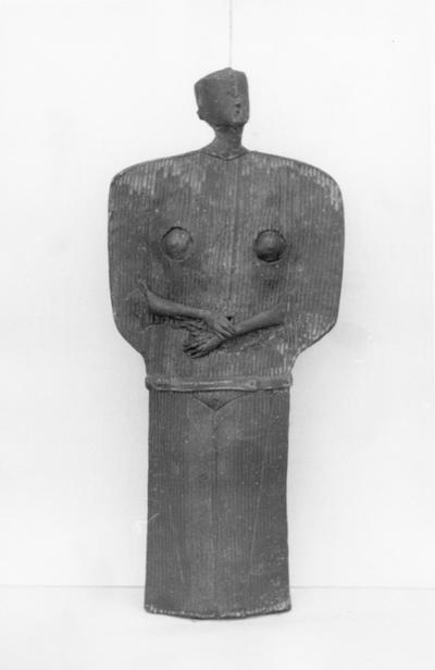 A pouch clay figure with its hands crossed by John Tuska