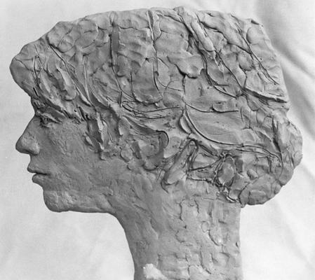 A ceramic head of Stephen Tuska in profile, showing the left side, by John Tuska