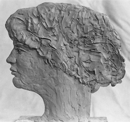 A ceramic head of Seth Tuska in profile, showing the left side, by John Tuska