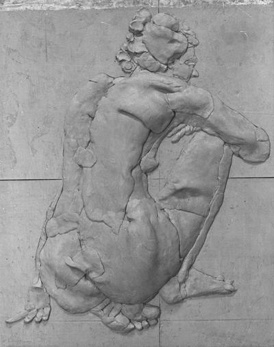 A fiberglass relief sculpture of a female nude by John Tuska